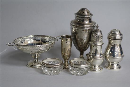 Five assorted silver condiments including an 18th century style bun pepper, a silver pedestal bonbon dish and a small posy vase,
